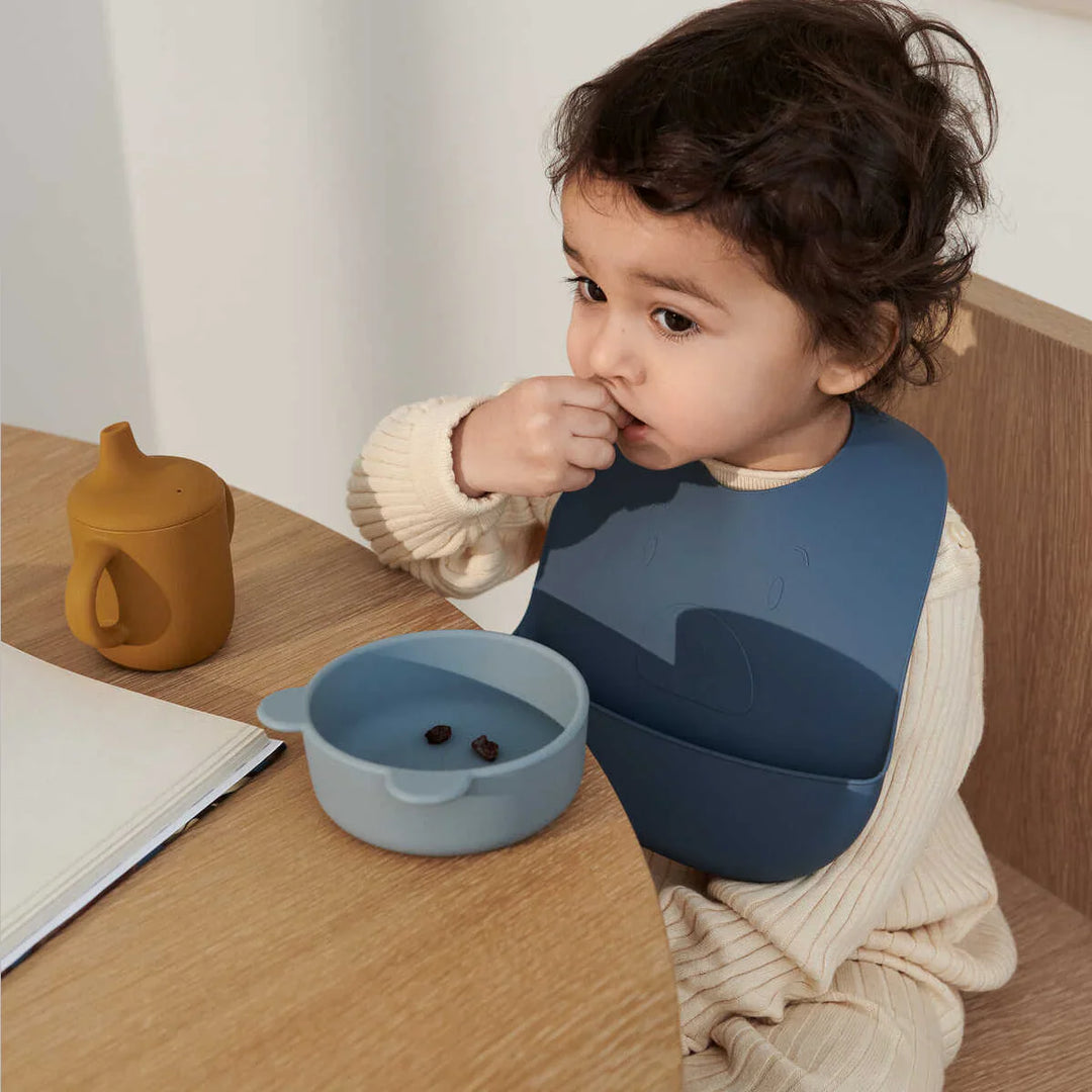 Liewood design and produce toys, interiors, furniture and accessories for children. Designed to be timeless, functional and passes on through generations. The image features the adorable Liewood Mr Bear Connor Baby Dining Set.