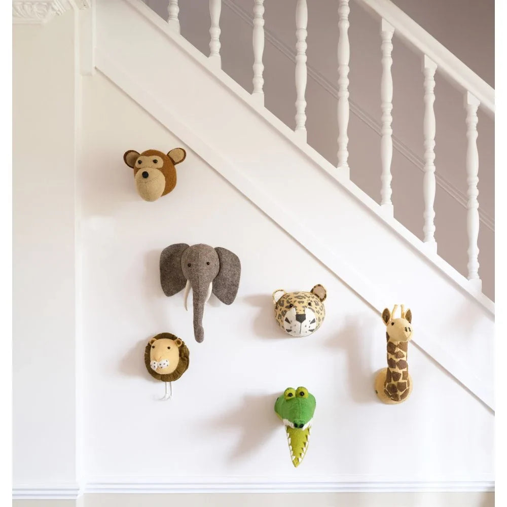 Fiona Walker create a range of quirky and fun animal themed home decor. The image features a range of products from their safari collection.